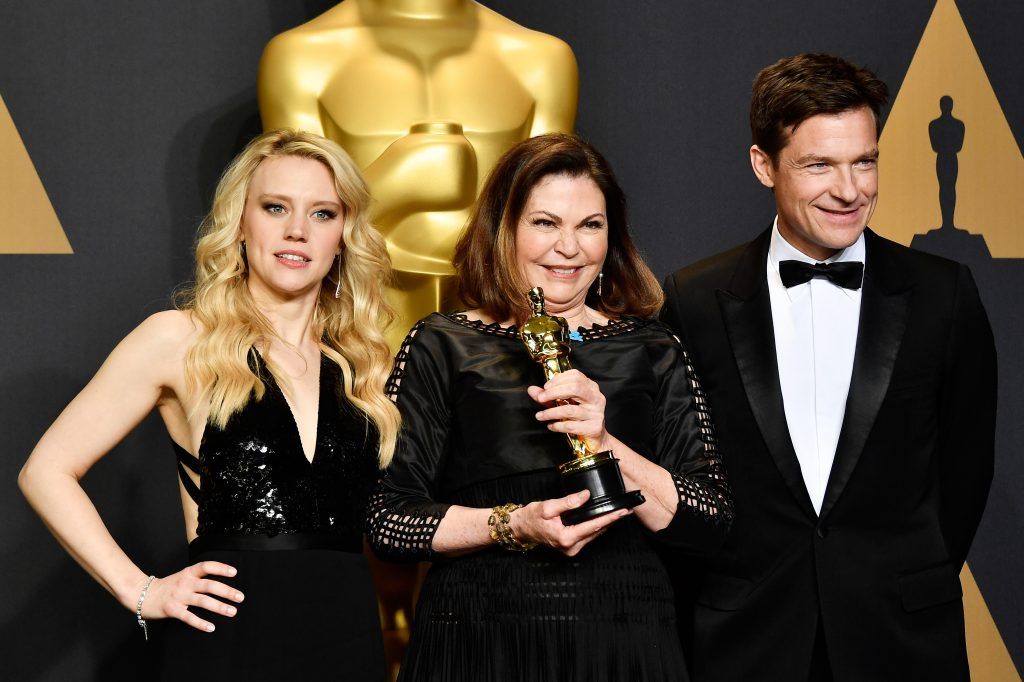 HOLLYWOOD, CA - FEBRUARY 26:  (L-R) Actor Kate McKinnon, costume designer Colleen Atwood, winner of the Best Costume Design award for 'Fantastic Beasts and Where to Find Them' and actor Jason Bateman pose in the press room during the 89th Annual Academy Awards at Hollywood & Highland Center on February 26, 2017 in Hollywood, California.  (Photo by Frazer Harrison/Getty Images)