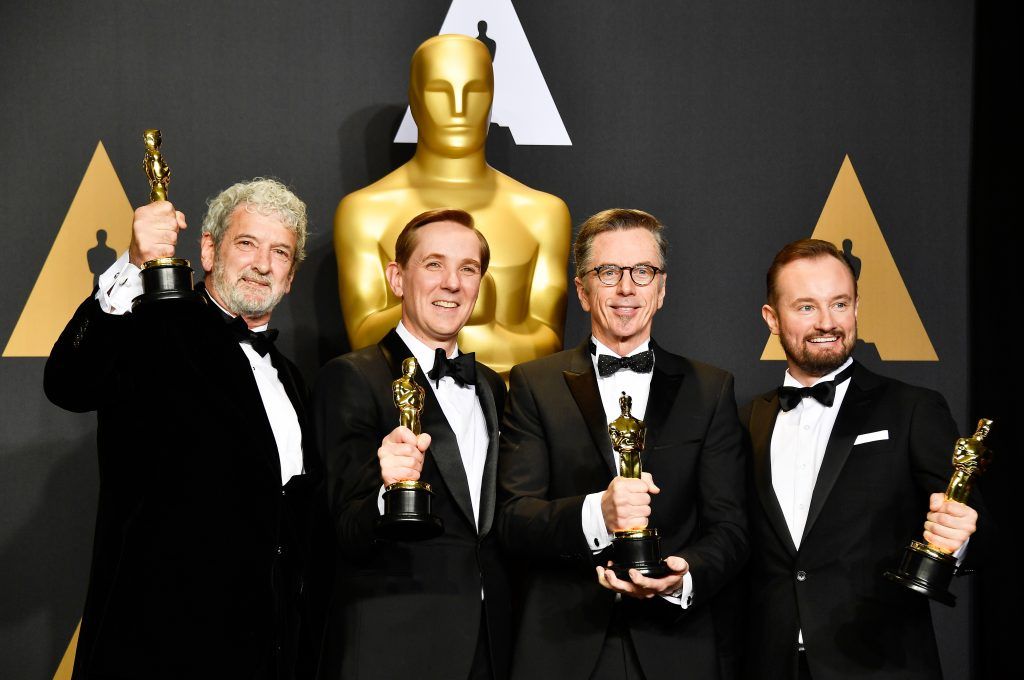 HOLLYWOOD, CA - FEBRUARY 26:  (L-R) Sound mixers Peter Grace, Robert Mackenzie, Kevin O'Connell and Andy Wright, winners of the Best Sound Mixing award for 'Hacksaw Ridge' pose in the press room during the 89th Annual Academy Awards at Hollywood & Highland Center on February 26, 2017 in Hollywood, California.  (Photo by Frazer Harrison/Getty Images)