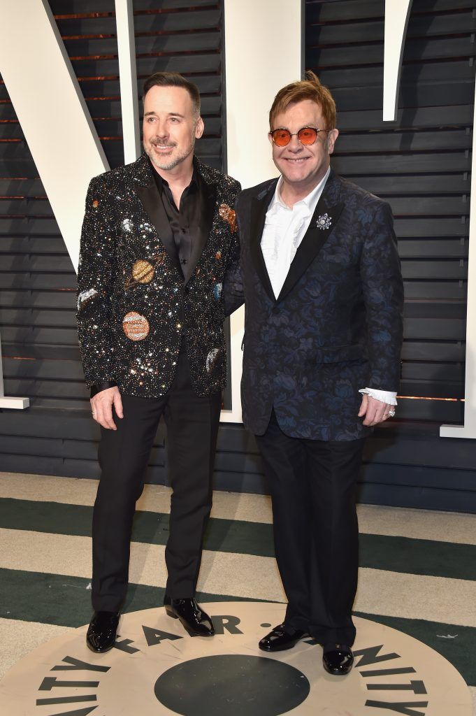 BEVERLY HILLS, CA - FEBRUARY 26:  Director-producer David Furnish (L) and recording artist Elton John attend the 2017 Vanity Fair Oscar Party hosted by Graydon Carter at Wallis Annenberg Center for the Performing Arts on February 26, 2017 in Beverly Hills, California.  (Photo by Pascal Le Segretain/Getty Images)