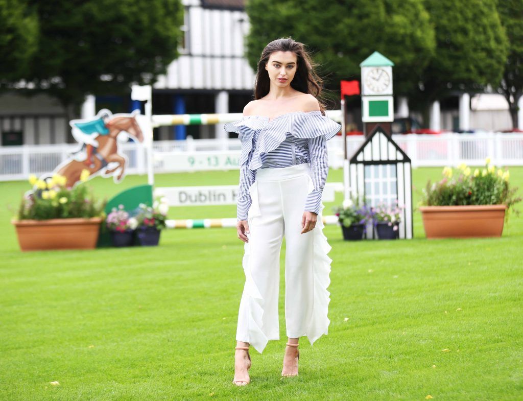 Pictured is model Sarah as top Irish stylist, Courtney Smith, is announced as a judge for the Dundrum Town Centre Ladies Day at the Dublin Horse Show in the RDS 10th August. Photograph: Leon Farrell / Photocall.