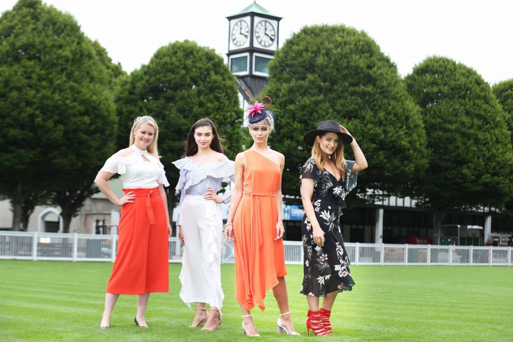 Pictured is Lorna Weightman, model Sarah, Gracie and Courtney Smith as she is  announced as a judge for the Dundrum Town Centre Ladies Day at the Dublin Horse Show in the RDS 10th August. Photograph: Leon Farrell / Photocall.