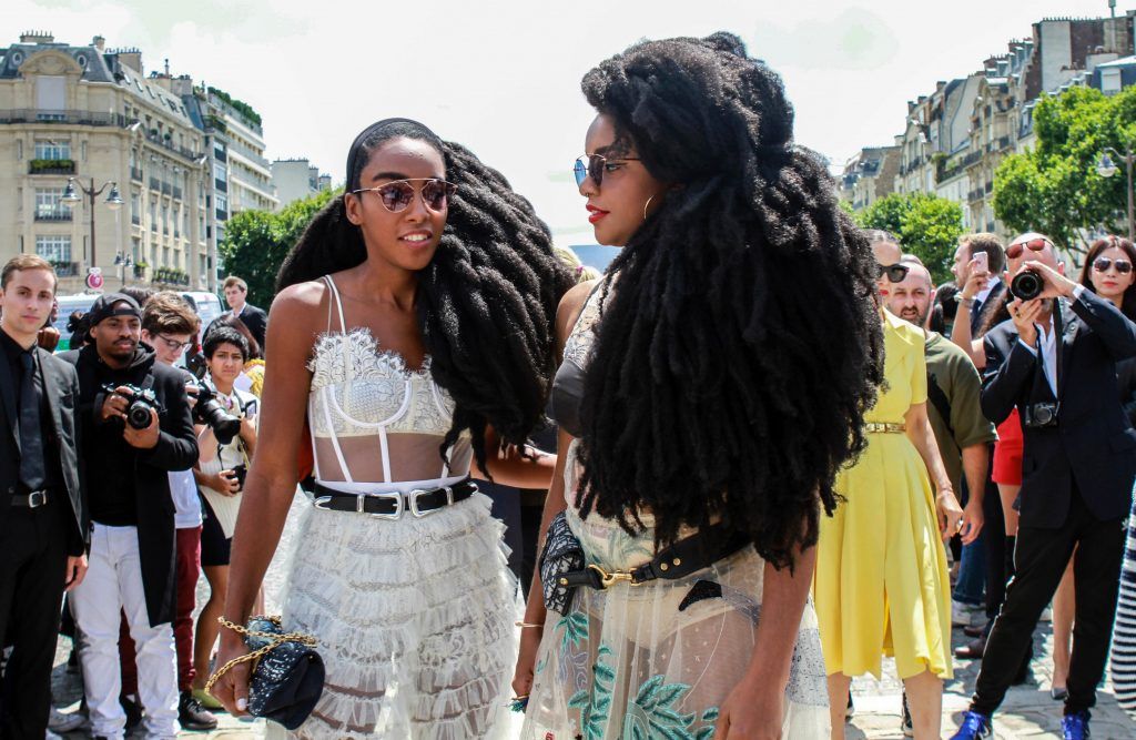 US singers TK Quann and Cipriana Quann arrive before Christian Dior 2017 fall/winter Haute Couture collection show in Paris on July 3, 2017. (Photo by AFP/Getty Images)