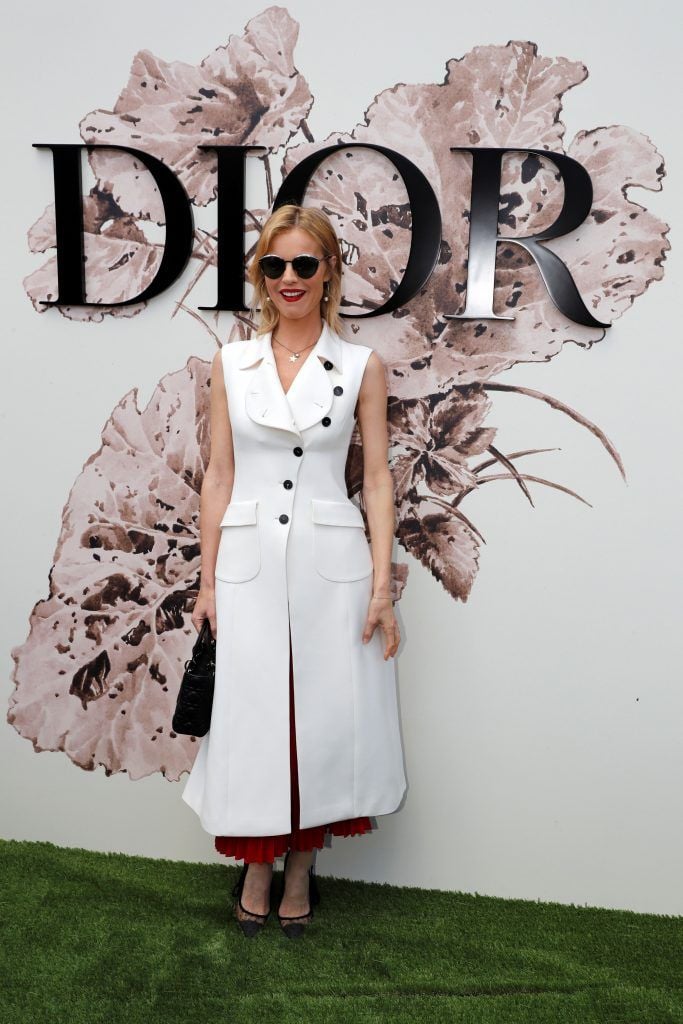 Czech model Eva Herzigova poses during the photocall before Christian Dior 2017 fall/winter Haute Couture collection show in Paris on July 3, 2017. (Photo by Patrick Kovarik/AFP/Getty Images)