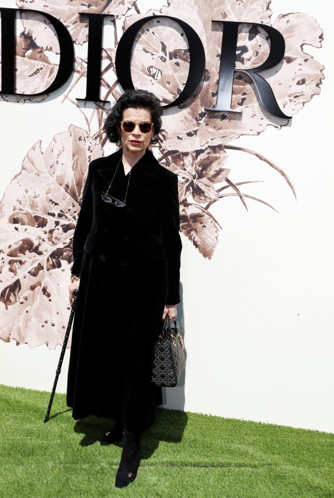 Bianca Jagger poses during the photocall before Christian Dior 2017 fall/winter Haute Couture collection show in Paris on July 3, 2017. (Photo by Patrick Kovarik/AFP/Getty Images)