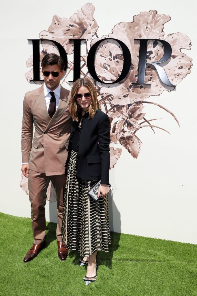 US actress and model Olivia Palermo and her husband Johannes Huebl pose during the photocall before Christian Dior 2017 fall/winter Haute Couture collection show in Paris on July 3, 2017. (Photo by Patrick Kovarik/AFP/Getty Images)