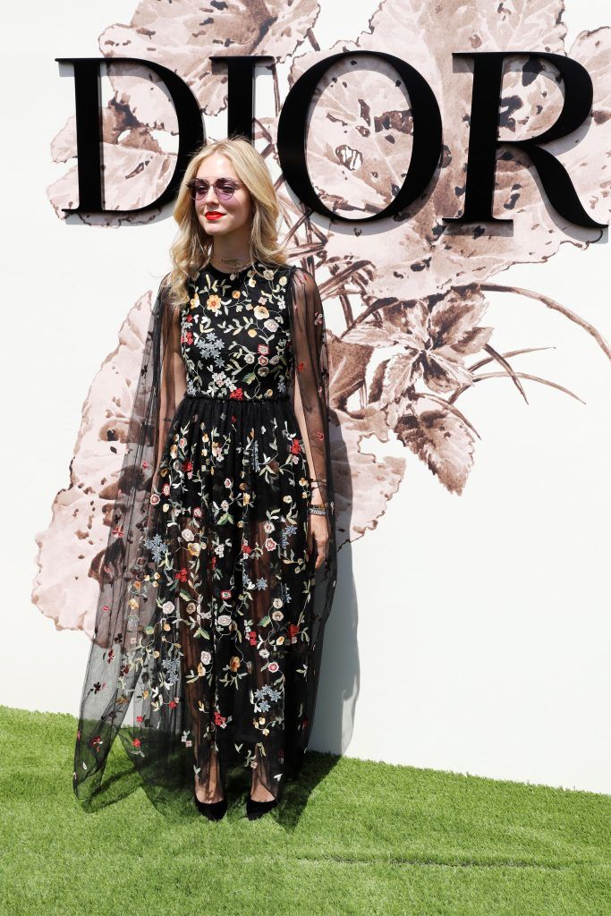 Italian blogger Ciara Ferragni poses during the photocall before Christian Dior 2017 fall/winter Haute Couture collection show in Paris on July 3, 2017. (Photo by Patrick Kovarik/AFP/Getty Images)