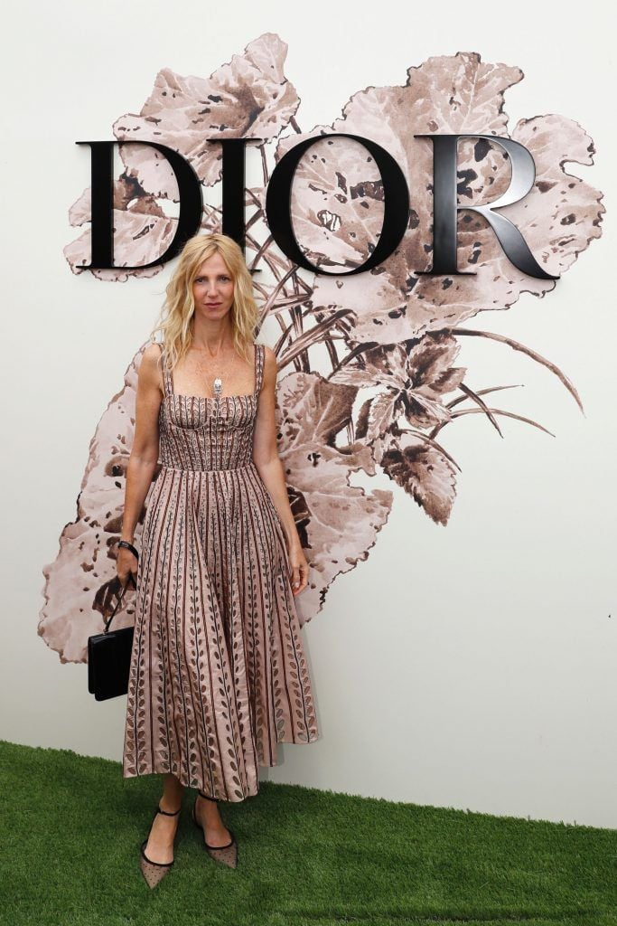 French actress Sandrine Kiberlain poses during the photocall before Christian Dior 2017 fall/winter Haute Couture collection show in Paris on July 3, 2017. (Photo by Patrick Kovarik/AFP/Getty Images)