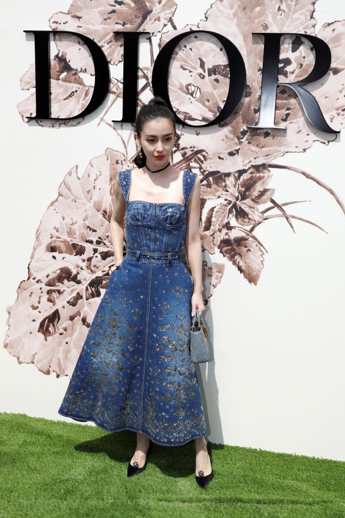 Chinese model and actress Angelababy poses during the photocall before Christian Dior 2017 fall/winter Haute Couture collection show in Paris on July 3, 2017. (Photo by Patrick Kovarik/AFP/Getty Images)