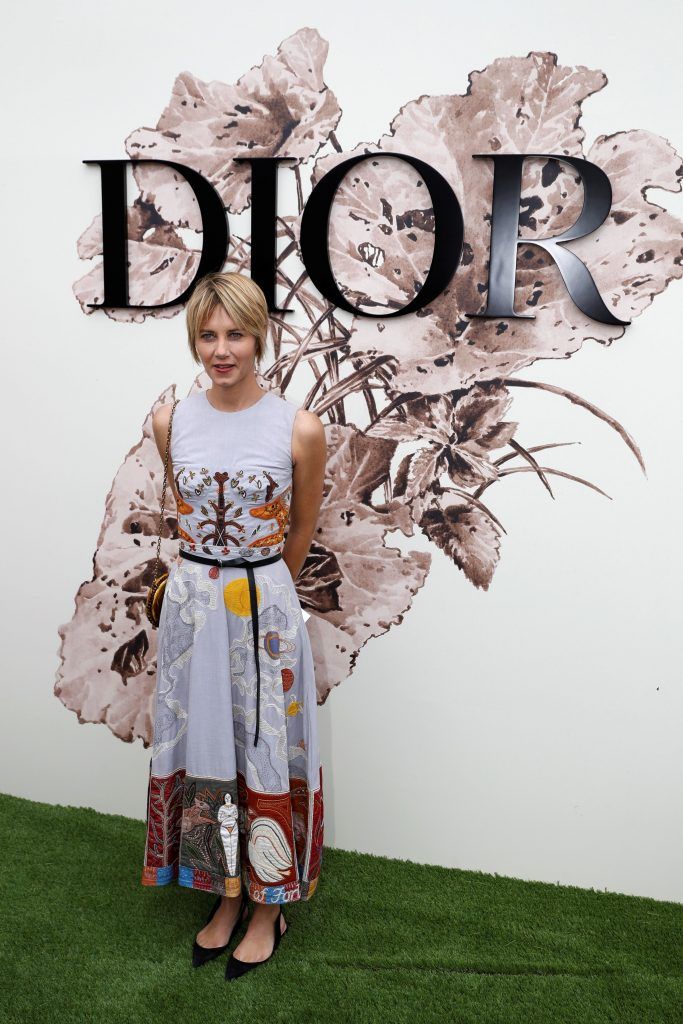 Isabella Uguccione poses during the photocall before Christian Dior 2017 fall/winter Haute Couture collection show in Paris on July 3, 2017. (Photo by Patrick Kovarik/AFP/Getty Images)