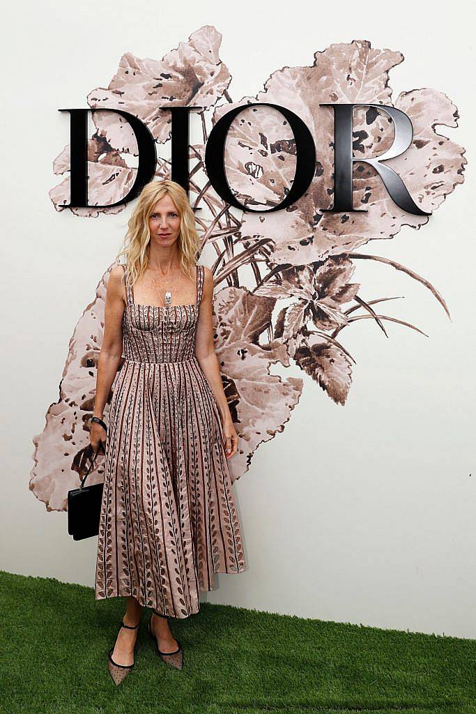 French actress Sandrine Kiberlain poses during the photocall before Christian Dior 2017 fall/winter Haute Couture collection show in Paris on July 3, 2017. (Photo by PATRICK KOVARIK/AFP/Getty Images)