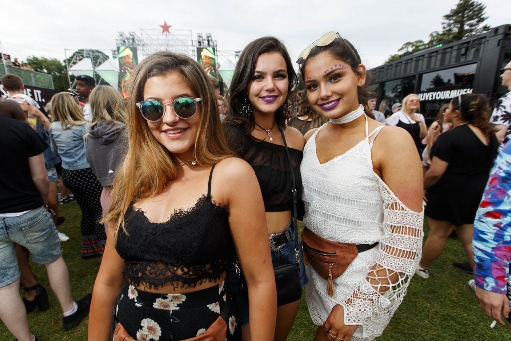 Meg Cassin with twins Julia and Kelly Kaulsay pictured at the Heineken 'Live Your Music' area, a new music experience that the crowd can control, at Longitude Festival 2017, Marlay Park. Picture by Andres Poveda