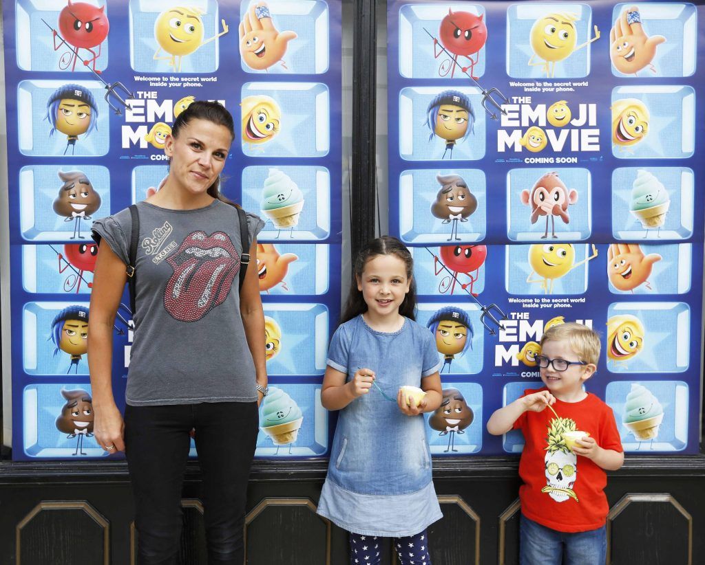 Pictured are Robin age 7 and Saul Hempenstall age 4 with mum Maria King at the Emoji Multimedia screening in Omniplex Rathmines, Dublin. Photographty: Sasko Lazarov