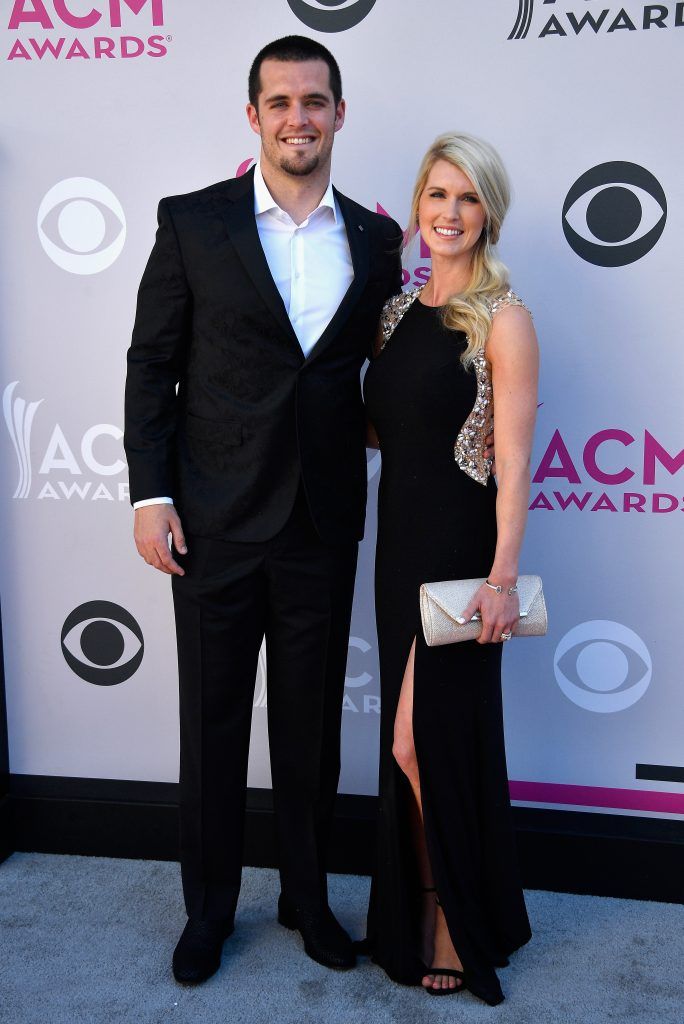 NFL player Derek Carr (L) and Heather Neel attend the 52nd Academy Of Country Music Awards at Toshiba Plaza on April 2, 2017 in Las Vegas, Nevada.  (Photo by Frazer Harrison/Getty Images)