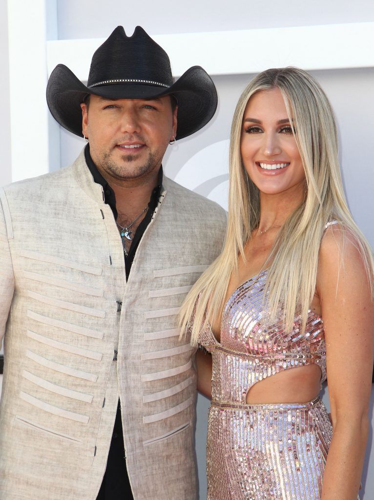 Recording artist Jason Aldean (L) and Brittany Kerr arrive for the 52nd Academy of Country Music Awards on April 2, 2017, at the T-Mobile Arena in Las Vegas, Nevada. (Photo  TOMMASO BODDI/AFP/Getty Images)