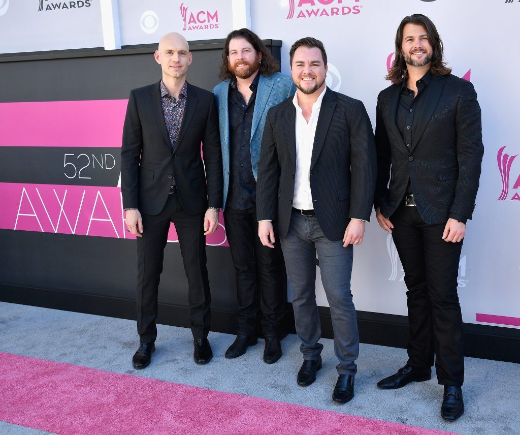 (L-R) Recording artists Jon Jones, James Young, Mike Eli, and Chris Thompson of music group Eli Young Band attend the 52nd Academy Of Country Music Awards at Toshiba Plaza on April 2, 2017 in Las Vegas, Nevada.  (Photo by Frazer Harrison/Getty Images)