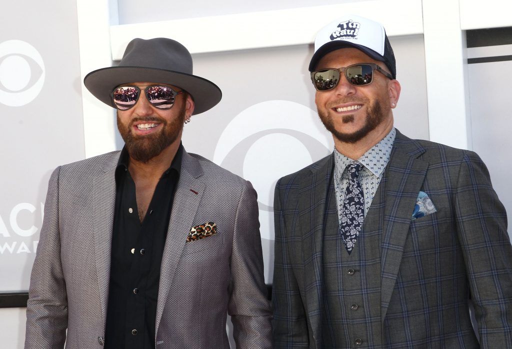 Preston Brust (L) and Chris Lucas of the duo LOCASH arrive for the 52nd Academy of Country Music Awards on April 2, 2017, at the T-Mobile Arena in Las Vegas, Nevada. (Photo  TOMMASO BODDI/AFP/Getty Images)