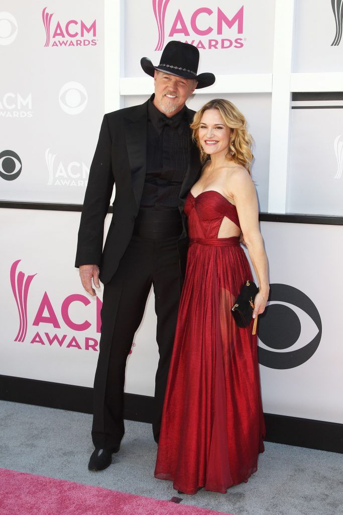 Recording artist Trace Adkins and guest arrive for the 52nd Academy of Country Music Awards on April 2, 2017, at the T-Mobile Arena in Las Vegas, Nevada. (Photo TOMMASO BODDI/AFP/Getty Images)