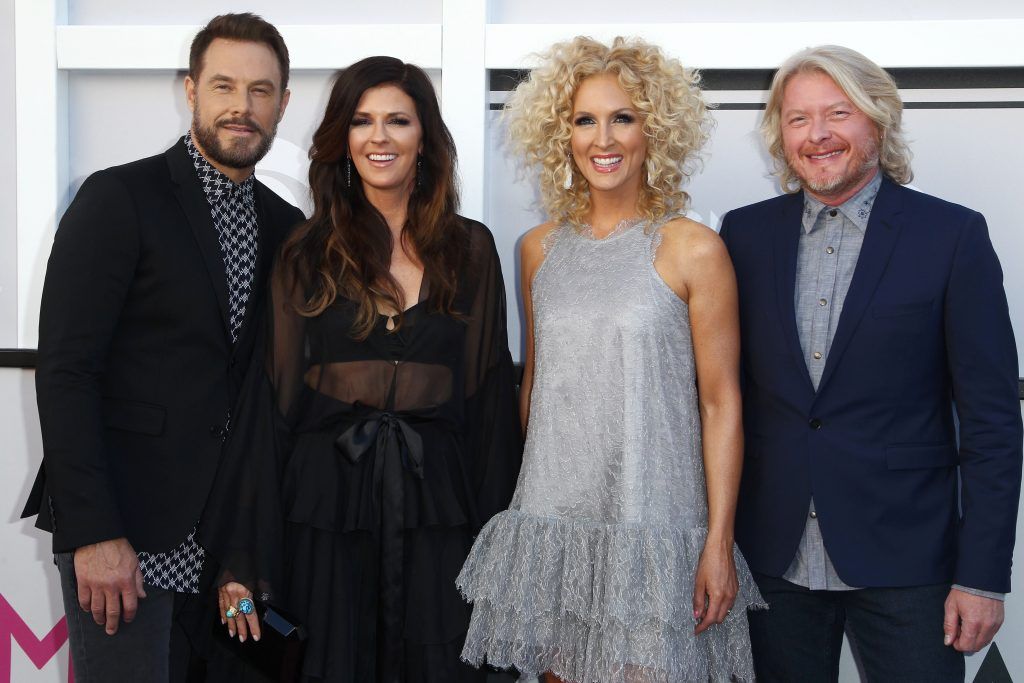 (L-R) Jimi Westbrook, Karen Fairchild, Kimberly Schlapman, and Phillip Sweet of the group Little Big Town arrive for the 52nd Academy of Country Music Awards on April 2, 2017, at the T-Mobile Arena in Las Vegas, Nevada.  (Photo TOMMASO BODDI/AFP/Getty Images)