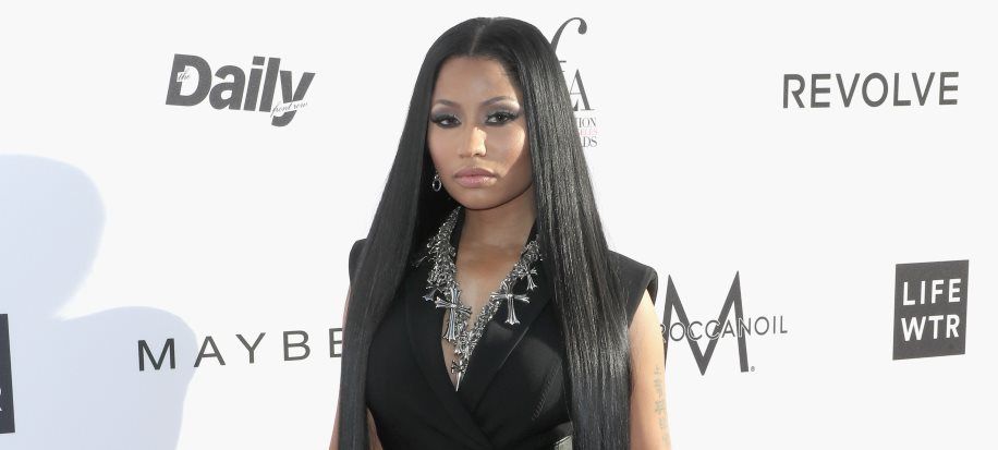 Nicki Minaj lives up to her Fashion Rebel award with daring snake outfit