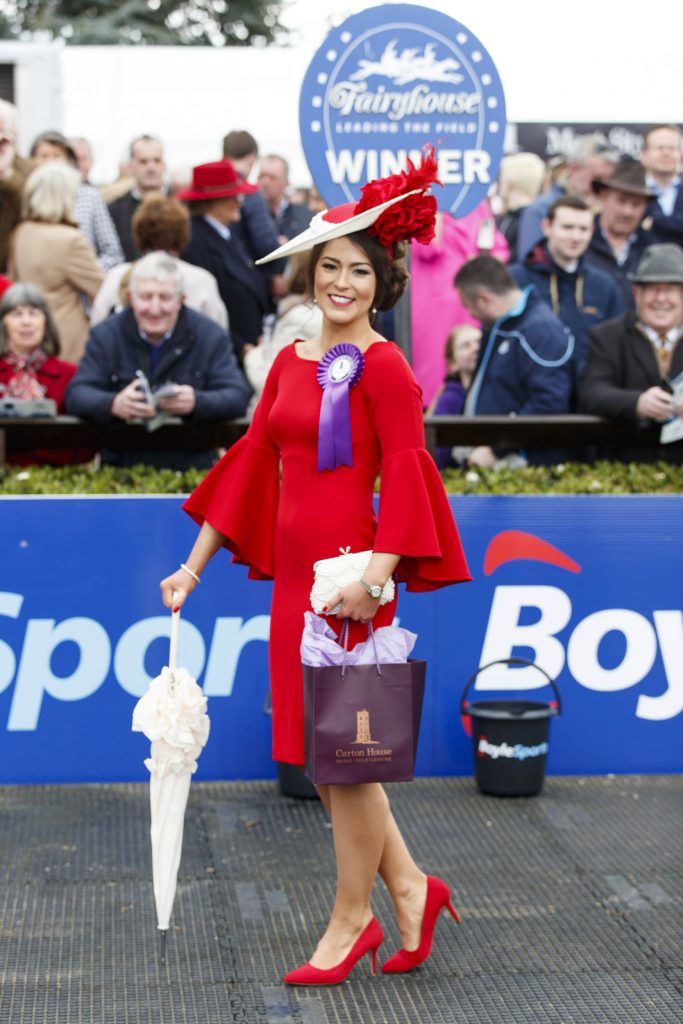 Stylish Laura Elliott from Belfast took home the coveted title of Carton House Most Stylish Lady standing out from the crowd in her Red Dress from Coast and Jenny Packham bag. Picture Andres Poveda
 
