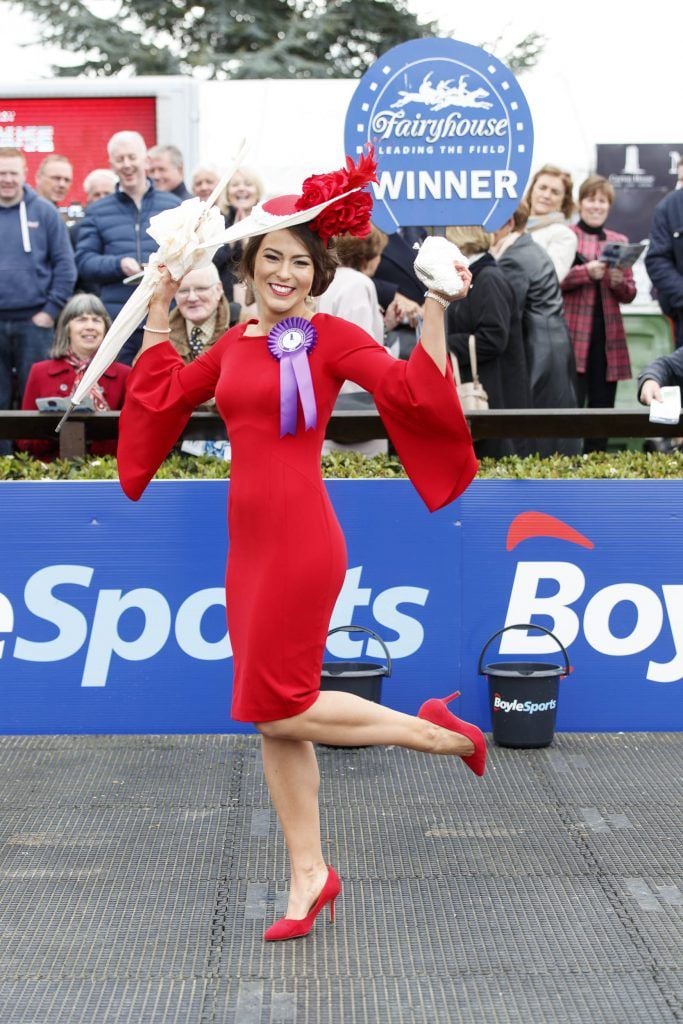 Stylish Laura Elliott from Belfast took home the coveted title of Carton House Most Stylish Lady standing out from the crowd in her Red Dress from Coast and Jenny Packham bag. Picture Andres Poveda
 