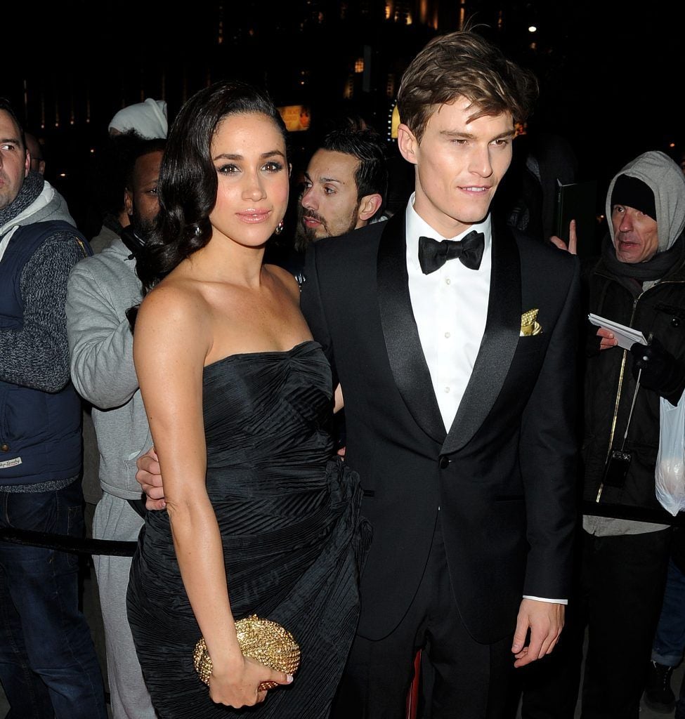 Meghan Markle & Oliver Cheshire attend The Global Gift Gala, a charity charity dinner and auction raising funds for the Eva Longoria Fund and Caudwell Children held at ME Hotel, in London, United Kingdom, 19 Nov 2013 (Photo by WENN.com).