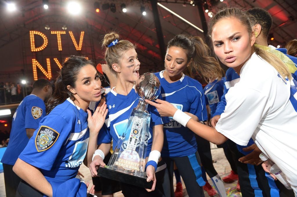 Meghan Markle, Nina Agdal,  Shay Mitchell and Chrissy Teigen participate in the DirecTV Beach Bowl at Pier 40 on February 1, 2014 in New York City.  (Photo by Michael Loccisano/Getty Images for DirecTV)