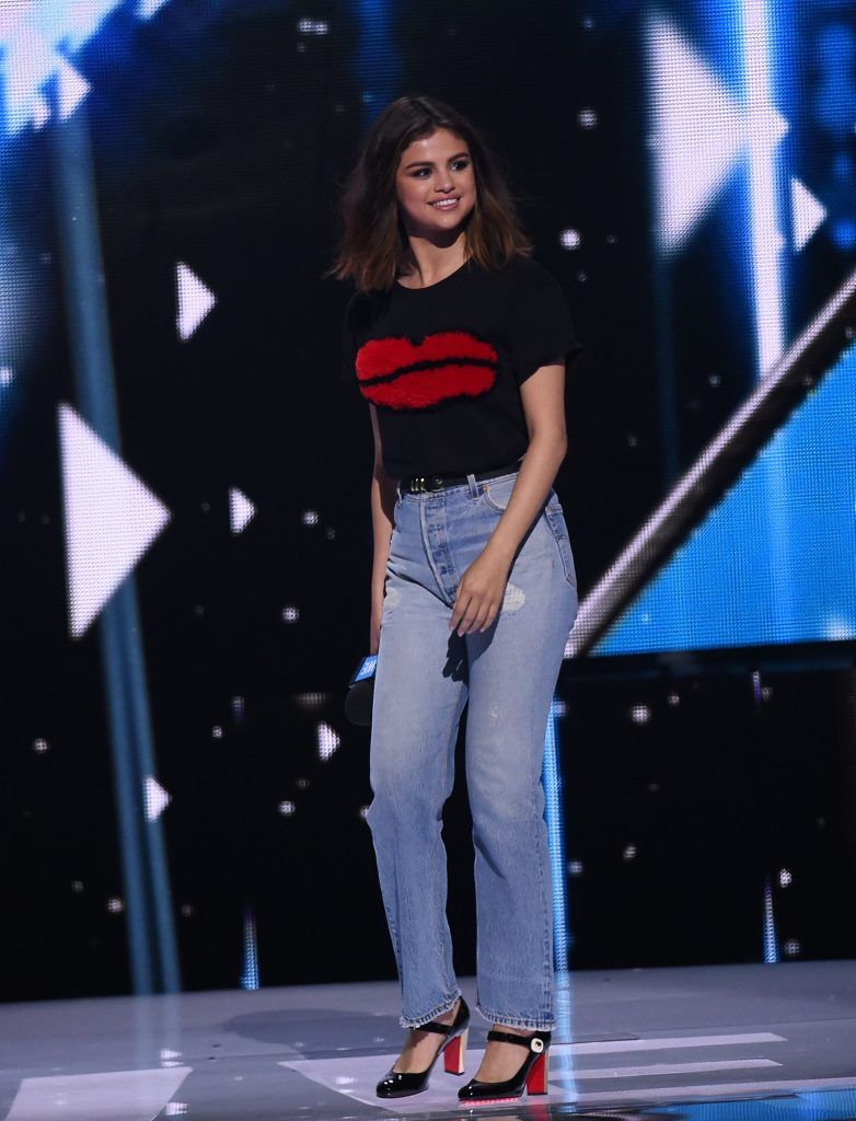 Selena Gomez appears on stage at WE Day California, April 27, 2017 at The Forum in Inglewood, California.  (Photo by ROBYN BECK/AFP/Getty Images)