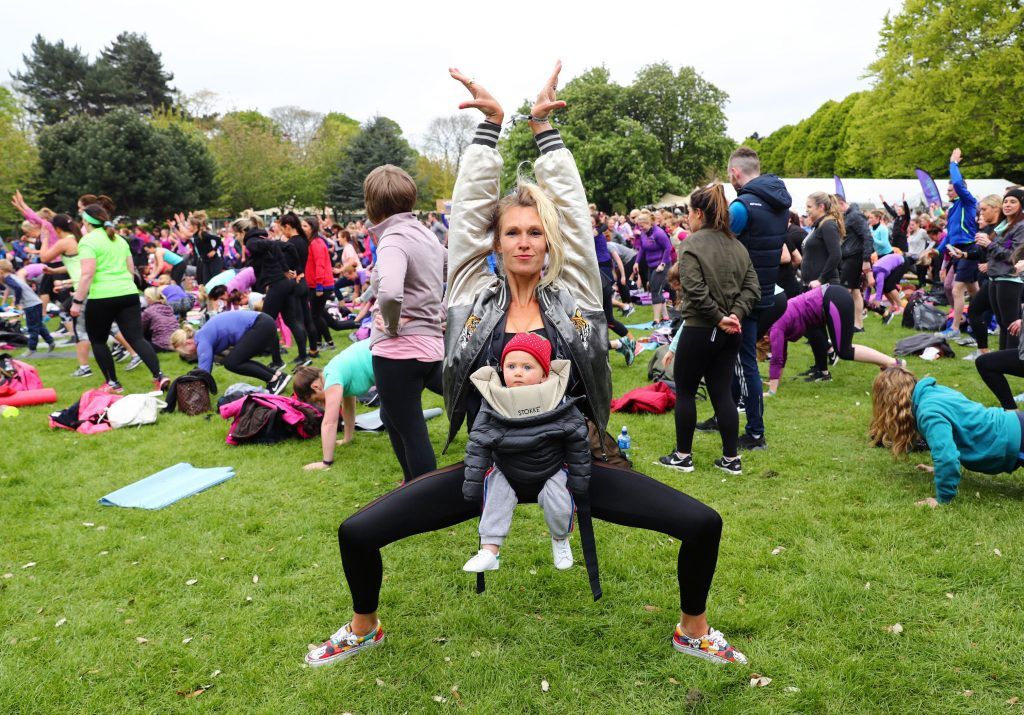 Pictured is Julietta Murrell from House of Voga, Yoga Vogueing with daughter Roxy aged 8 months as over 5,000 people descended on Dublin's Herbert park for WellFest, Ireland's only health, wellness and fitness festival. Pic: Marc O'Sullivan