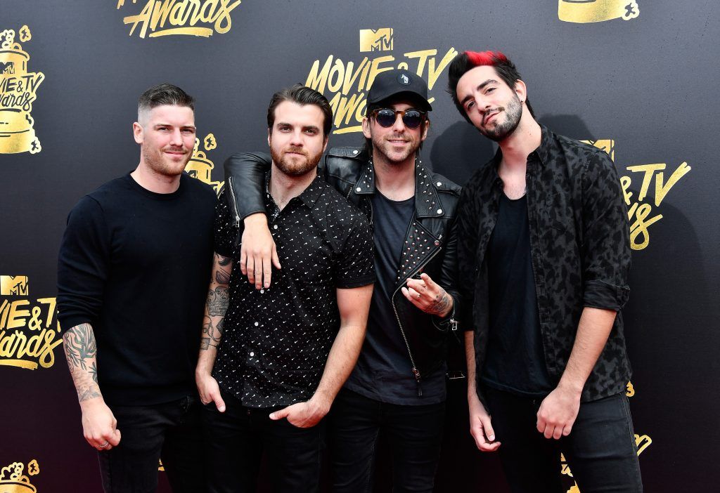 LOS ANGELES, CA - MAY 07:  (L-R) Musician Zack Merrick, Rian Dawson, Alex Gaskarth and Jack Barakat of All Time Low attend the 2017 MTV Movie And TV Awards at The Shrine Auditorium on May 7, 2017 in Los Angeles, California.  (Photo by Frazer Harrison/Getty Images)