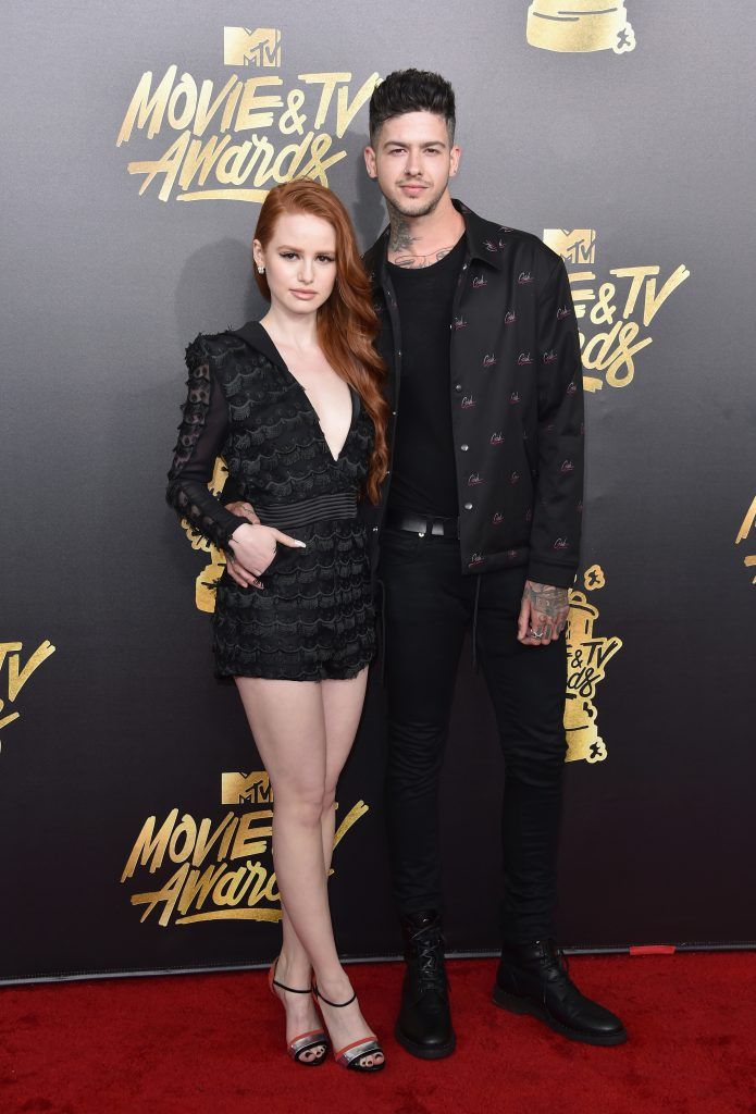 LOS ANGELES, CA - MAY 07:  Actor Madelaine Petsch (L) and rapper Travis Mills attend the 2017 MTV Movie And TV Awards at The Shrine Auditorium on May 7, 2017 in Los Angeles, California.  (Photo by Alberto E. Rodriguez/Getty Images)