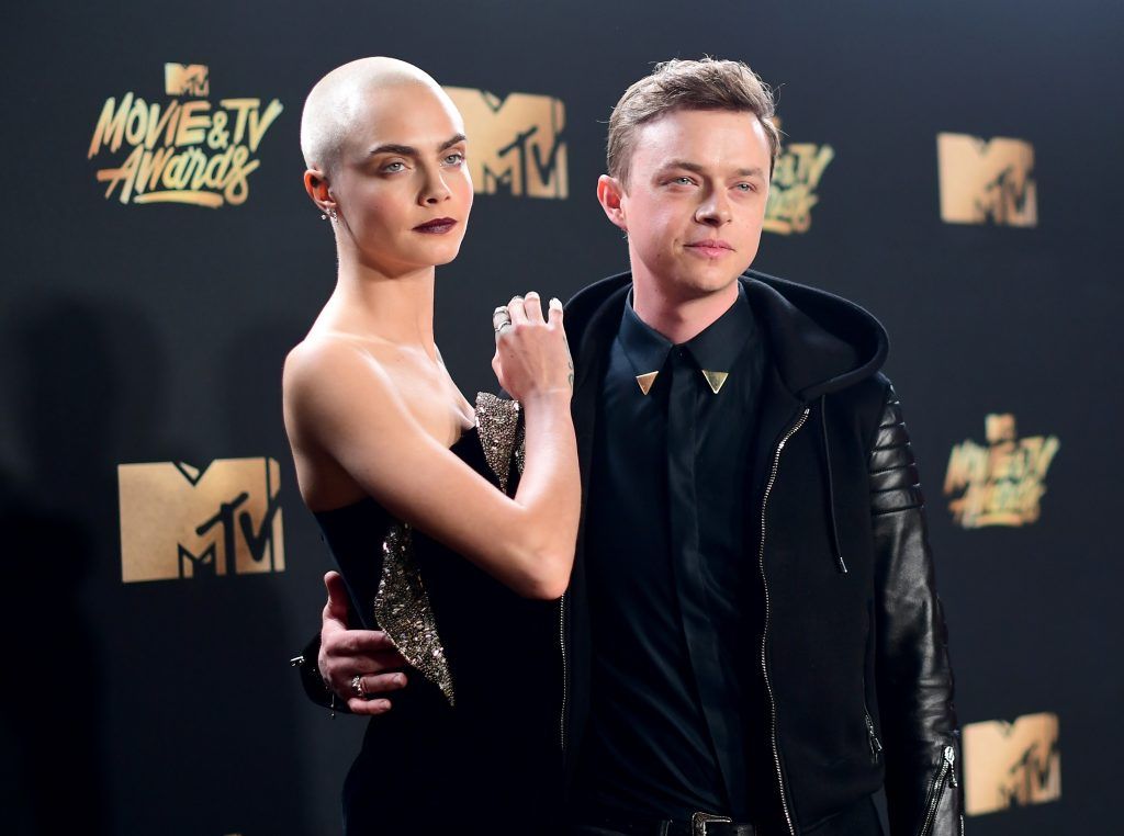 LOS ANGELES, CA - MAY 07:  Actors Cara Delevingne (L) and Dane DeHaan attend the 2017 MTV Movie And TV Awards at The Shrine Auditorium on May 7, 2017 in Los Angeles, California.  (Photo by Matt Winkelmeyer/Getty Images)