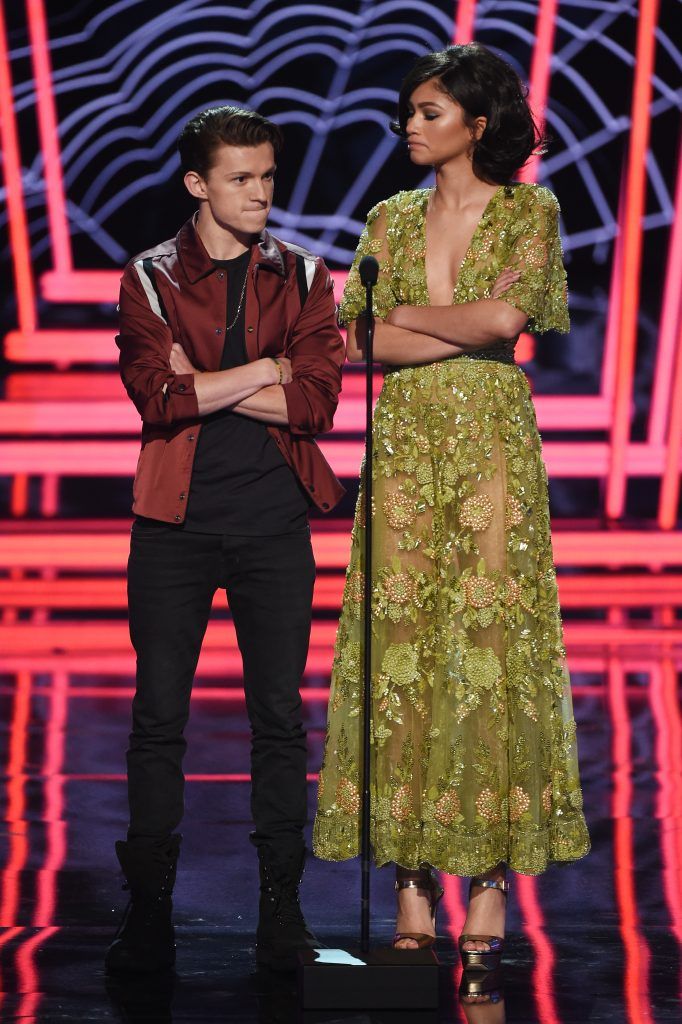 Tom Holland (L) and Zendaya speak onstage during the 2017 MTV Movie And TV Awards at The Shrine Auditorium on May 7, 2017 in Los Angeles, California.  (Photo by Kevin Winter/Getty Images)