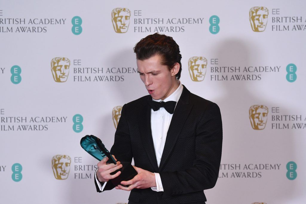 British actor Tom Holland poses with the Rising Star award at the BAFTA British Academy Film Awards at the Royal Albert Hall in London on February 12, 2017. (Photo by Ben Stansall/AFP/Getty Images)