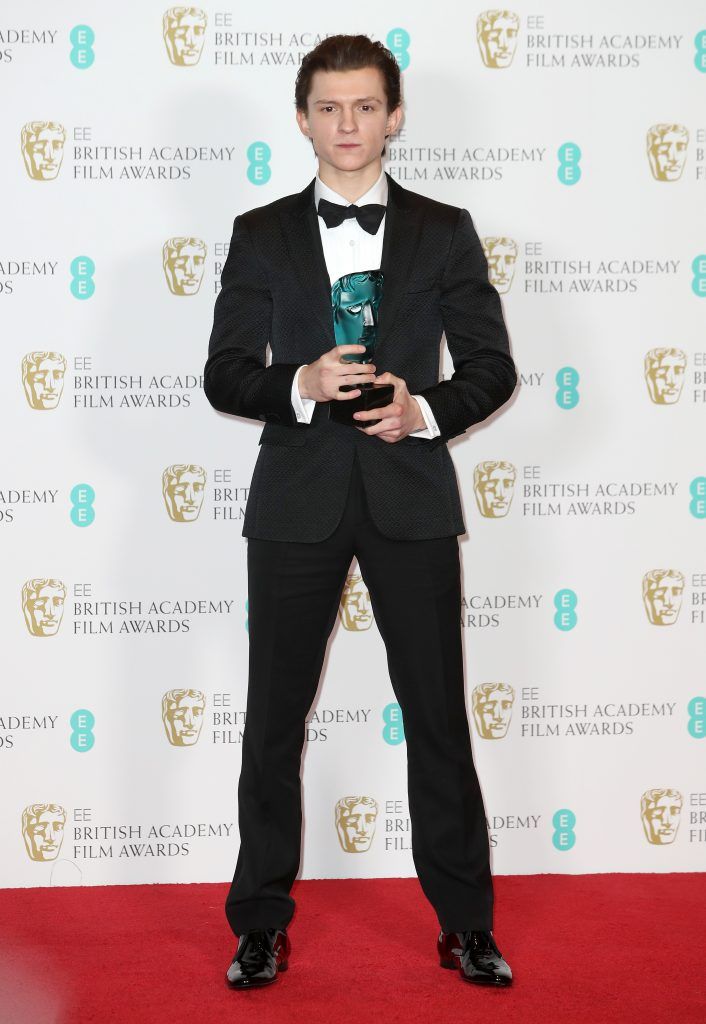 EE Rising Star winner actor Tom Holland poses with his award in the winners room during the 70th EE British Academy Film Awards (BAFTA) at Royal Albert Hall on February 12, 2017 in London, England.  (Photo by Chris Jackson/Getty Images)