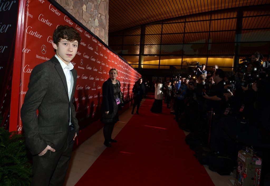 Tom Holland arrives at the 24th annual Palm Springs International Film Festival Awards Gala at the Palm Springs Convention Center on January 5, 2013 in Palm Springs, California.  (Photo by Michael Buckner/Getty Images For Palm Springs Film Festival)