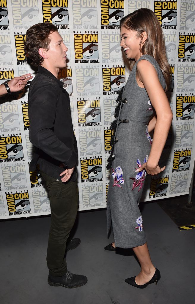 Tom Holland (L) and Zendaya from Marvel Studios Spider-Man: Homecoming attend the San Diego Comic-Con International 2016 Marvel Panel in Hall H on July 23, 2016 in San Diego, California. ©Marvel Studios 2016. ©2016 CTMG. All Rights Reserved.  (Photo by Alberto E. Rodriguez/Getty Images for Disney)