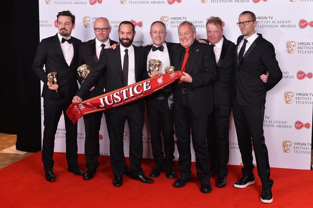 (L-R) Andy Worboys, Nicholas Bennett, Daniel Gordon, Andy Boag, Phil Scraton, Tim Atack and John Battsek pose with the award for Single Documentary in the Winner's room at the Virgin TV BAFTA Television Awards at The Royal Festival Hall on May 14, 2017 in London, England.  (Photo by Jeff Spicer/Getty Images)