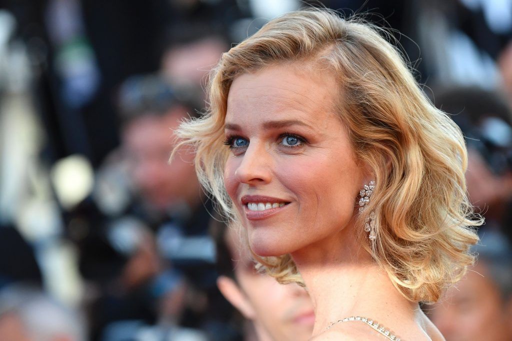 Czech model Eva Herzigova poses as she arrives on May 17, 2017 for the screening of the film 'Ismael's Ghosts' (Les Fantomes d'Ismael) during the opening ceremony of the 70th edition of the Cannes Film Festival in Cannes, southern France. (Photo ALBERTO PIZZOLI/AFP/Getty Images)