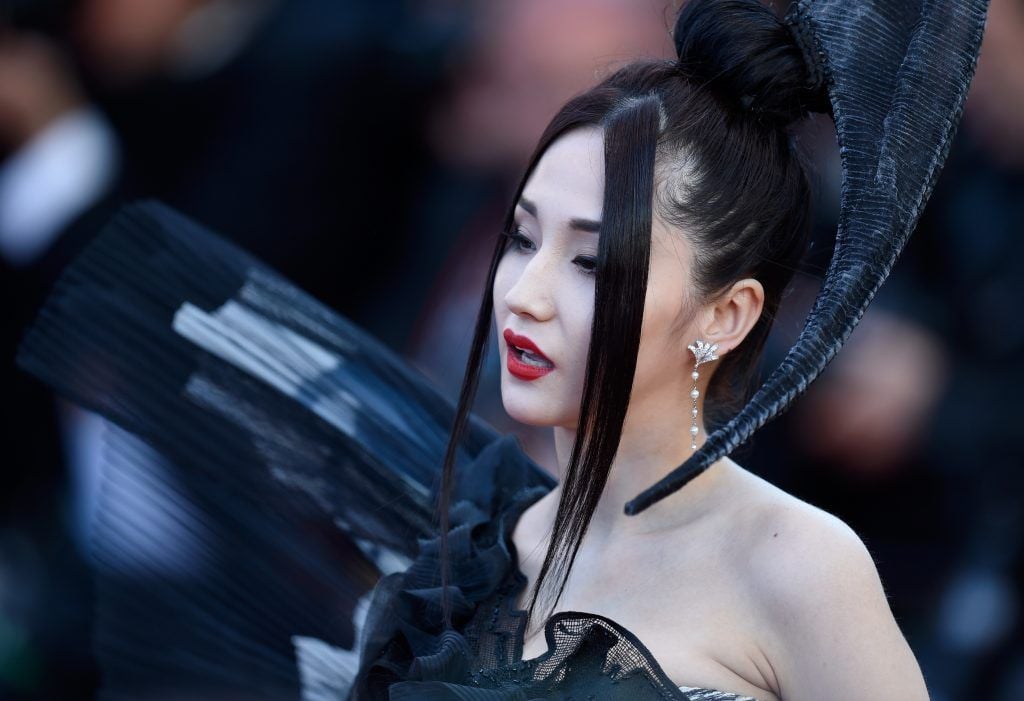 Lan Yan (English name Crazybarby Len Lan Yan)  attends the "Ismael's Ghosts (Les Fantomes d'Ismael)" screening and Opening Gala during the 70th annual Cannes Film Festival at Palais des Festivals on May 17, 2017 in Cannes, France.  (Photo by Antony Jones/Getty Images)