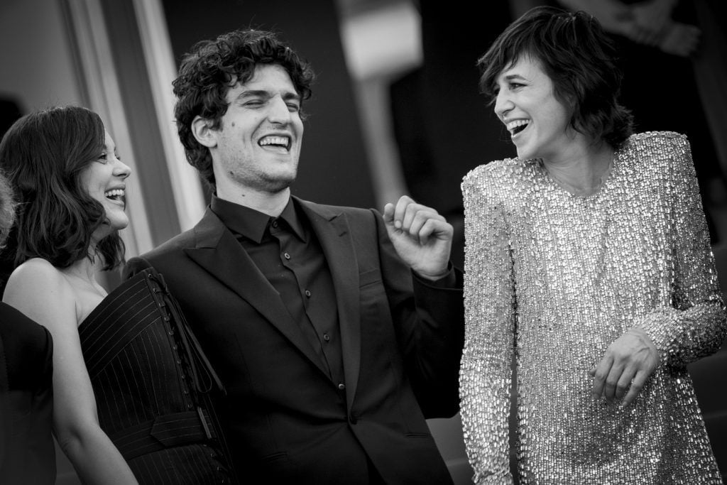 Actors Marion Cotillard, Louis Garrel and Charlotte Gainsbourg attend the 'Ismael's Ghosts (Les Fantomes d'Ismael)' screening and Opening Gala during the 70th annual Cannes Film Festival at Palais des Festivals on May 17, 2017 in Cannes, France. (Photo by Tristan Fewings/Getty Images)
