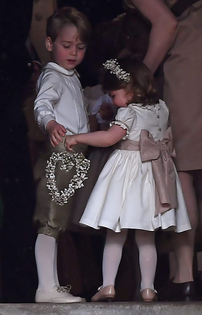 Britain's prince George (L), a pageboy, attends the wedding of his aunt Pippa Middleton to James Matthews at St Mark's Church in Englefield, west of London, on May 20, 2017. (Photo by JUSTIN TALLIS/AFP/Getty Images)