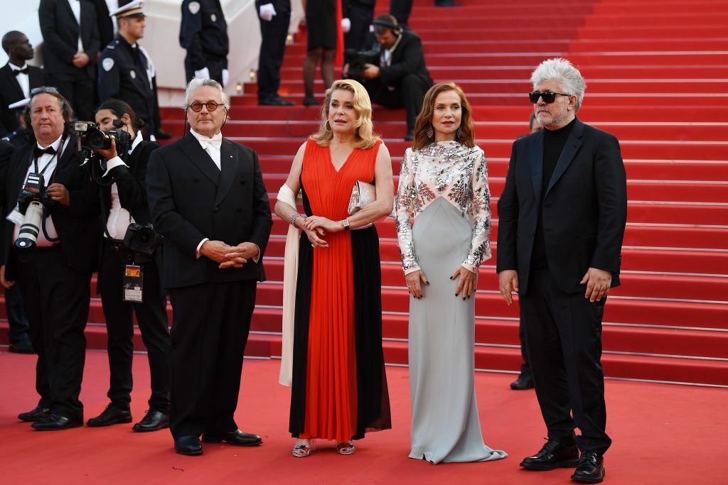 (L-R) George Miller, Catherine Deneuve, Isabelle Huppert and Pedro Almodovar attend the 70th Anniversary of the 70th annual Cannes Film Festival at Palais des Festivals on May 23, 2017 in Cannes, France.  (Photo by Pascal Le Segretain/Getty Images)