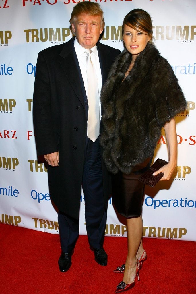 Donald Trump and Melania Trump arrive for a birthday celebration and shopping soiree for Vanessa & Don Trump Jr. to support Operation Smile at FAO Schwartz on December 11, 2006 in New York City.  (Photo by Scott Wintrow/Getty Images)