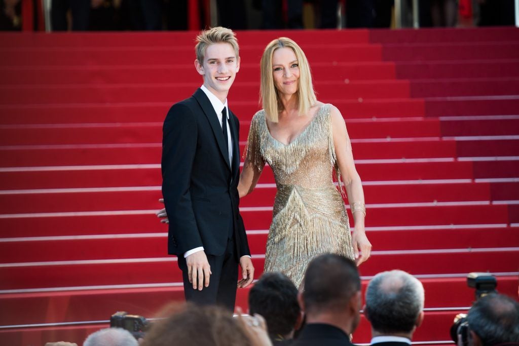 Uma Thurman (R) and her son Levon Roan Thurman-Hawke attend the Closing Ceremony of the 70th annual Cannes Film Festival at Palais des Festivals on May 28, 2017 in Cannes, France.  (Photo by Matthias Nareyek/Getty Images)