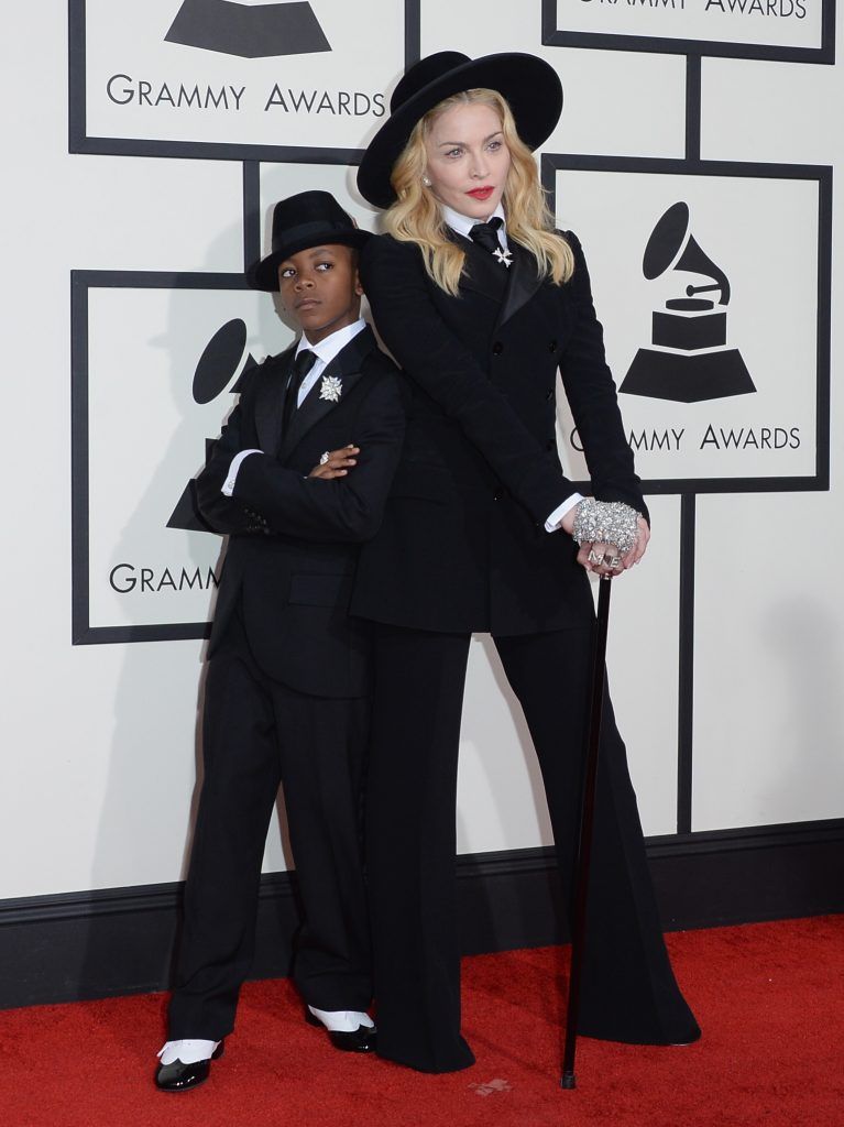 Madonna nailed the embarrassing mum look when she walked the Grammys red carpet with son David. (Photo by Jason Merritt/Getty Images)