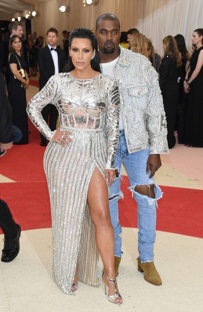 Kim Kardashian West and Kanye West's matching outfits definitely fit the dress code at the 'Manus x Machina: Fashion In An Age Of Technology' Costume Institute Gala. (Photo by Larry Busacca/Getty Images)