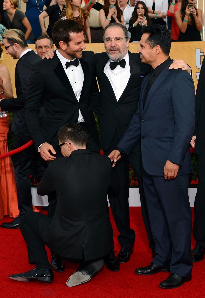 Ukrainian reporter and prankster Vitalii Sediuk grabbed Bradley Cooper's crotch at Screen Actors Guild Awards in 2014. (Photo by Ethan Miller/Getty Images)