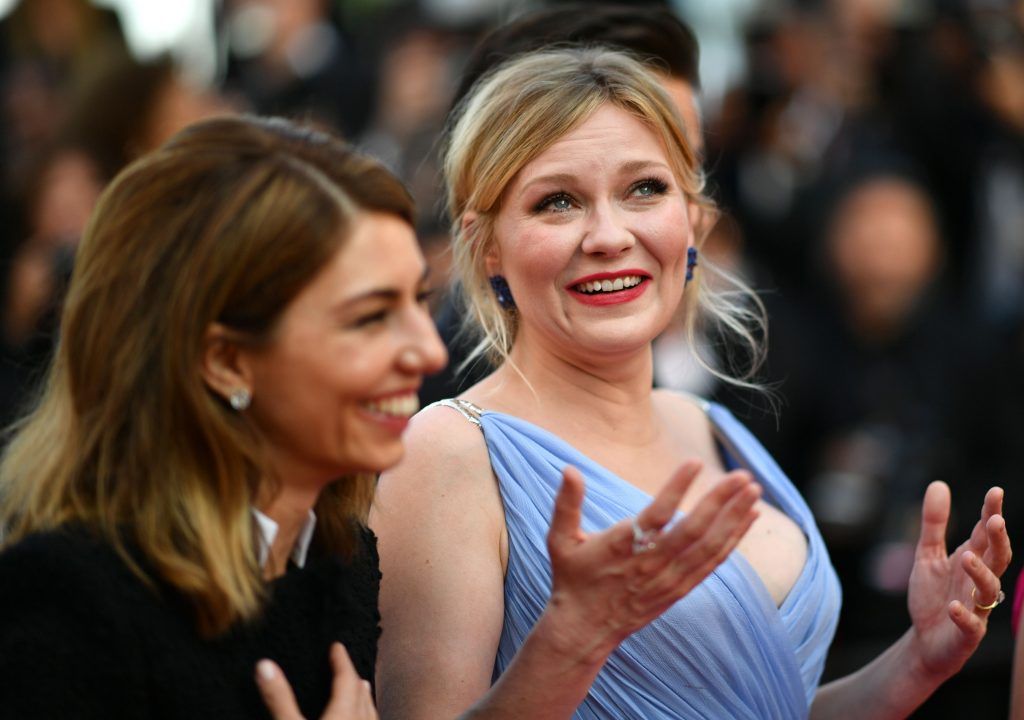 Kirsten Dunst broke down on the red carpet at Cannes 2017, but apparently they were happy tears because she was at the festival with Sofia Coppola. (Photo by Loic Venance/AFP/Getty Images)