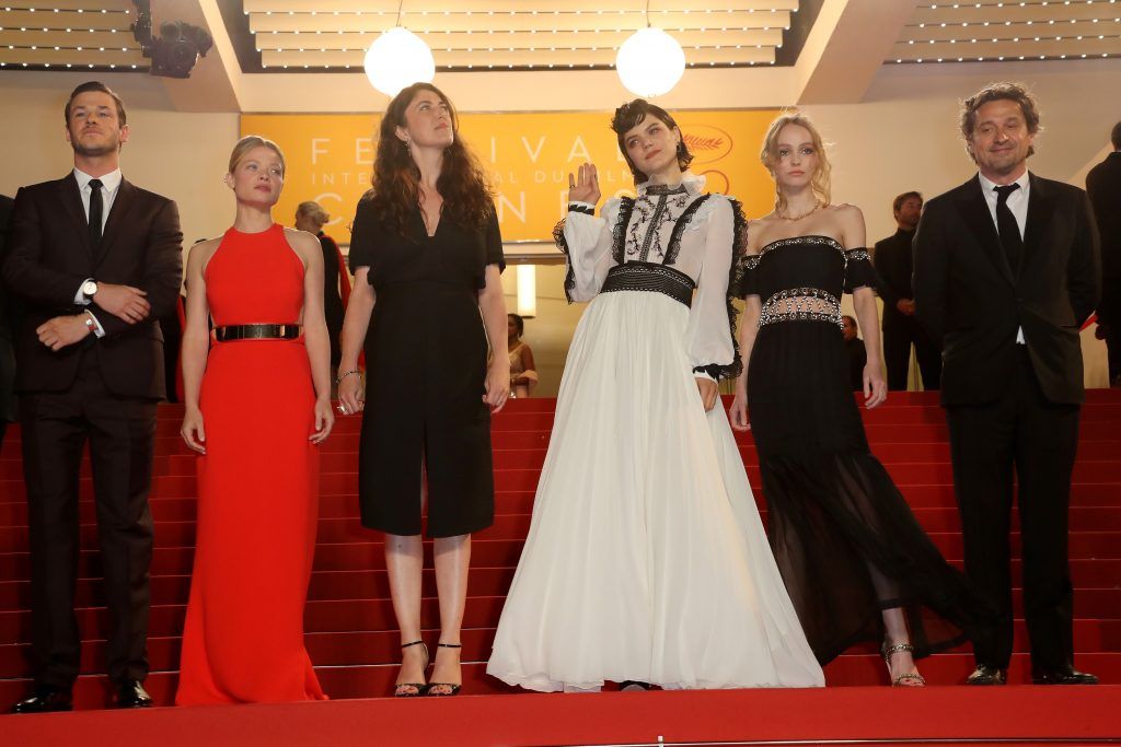 Gaspard Ulliel, Melanie Thierry, Stephanie Di Giusto, French Stephanie Sokolinski aka Soko, Lily-Rose Depp and Louis-Do de Lencquesaing pose as they arrive on May 13, 2016 for the screening of the film 'La Danseuse (The Dancer)' at the 69th Cannes Film Festival in Cannes, southern France. (Photo by VALERY HACHE/AFP/Getty Images)